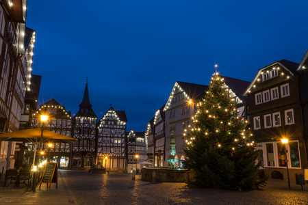 FRITZLAR, GERMANY: 25th December 2017: The marketplace of Fritzlar with Christmas tree and fairy lights during blue hourのeditorial素材