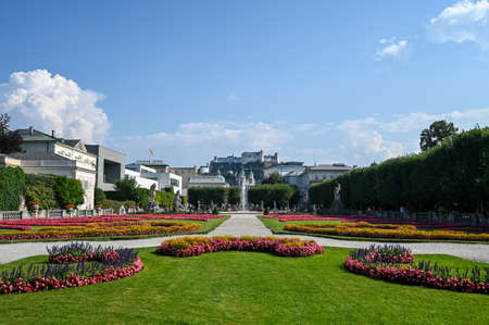 Garden Mirabell with castle Hohensalzburg in the background in Salzburg on a sunny dayのeditorial素材