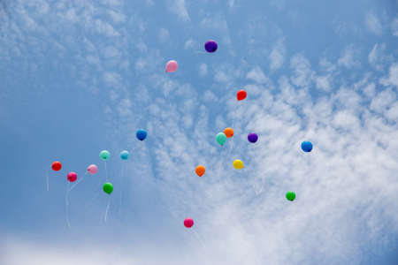 Air gel balls flying in the clear blue skyの写真素材