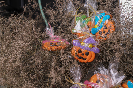 Pumpkin-shaped gingerbreads for Halloween. Edible Halloween decor.Halloween cookies in the shape of pumpkin, bat, ghostの写真素材