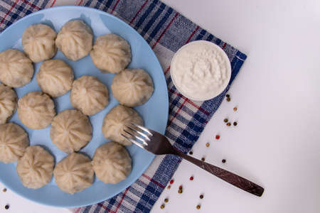 National Georgian cuisine. Khinkali with meat. Khinkali on a plate close-upの写真素材