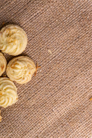 Homemade butter cookies on a burlap background. Top view.の写真素材