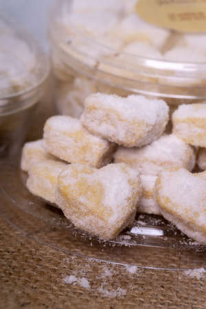 Heart shaped cookies in a glass jar. Shallow depth of field.の写真素材