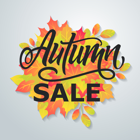 Autumn sale flyer on a background of leaves. Handmade vector lettering. Vector illustrationのイラスト素材