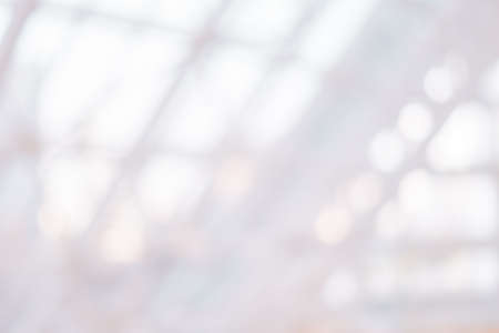 Specific ceiling of business center background blurred lightの写真素材