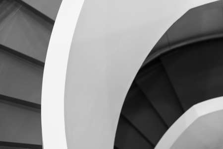 Black and white spiral stairs abstract fragmentの写真素材