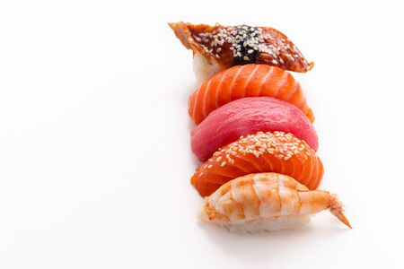 Creative layout with various sushi with eel, shrimp, salmon and tuna  on white backgroundの写真素材