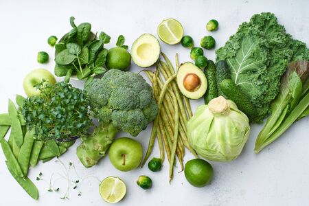 Creative flat lay with healthy vegetarian meal ingredients. Raw food concept. A variety of organic fruits and vegetables with avocado. Vegan menu
の写真素材