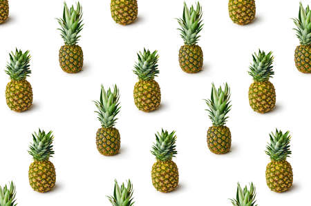 Pattern with fresh pineapples isolated on white background. Creative food concept.の写真素材