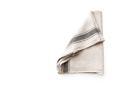 Flat lay with rustic linen kitchen napkin isolated on white background. Overhead image of folded cloth for mockupの写真素材