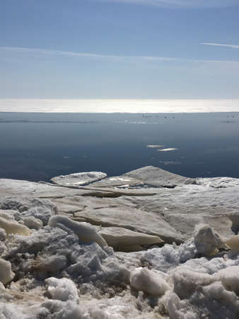 iced ocean and blue sky in winterの写真素材