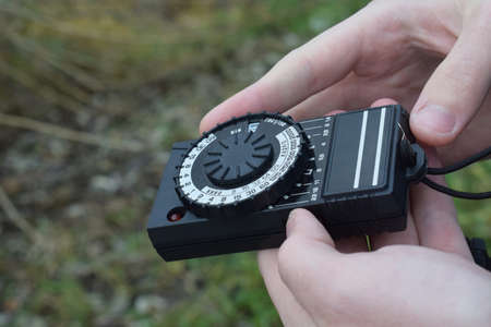 expose meter from ussr in handsの写真素材