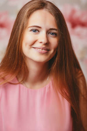 girl in a pink dress on a colored background with different emotions