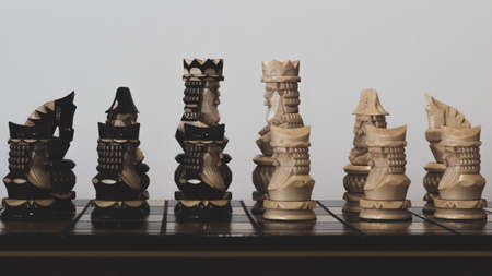 chess black and white king with pawns on the playing board