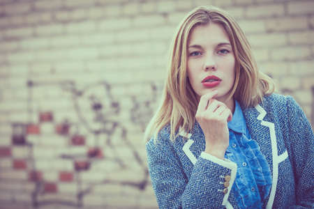 portrait of a beautiful young  girl  outdoors at the day timeの写真素材