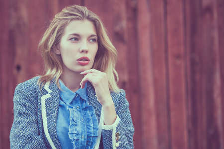 portrait of a beautiful young  girl  outdoors at the day timeの写真素材