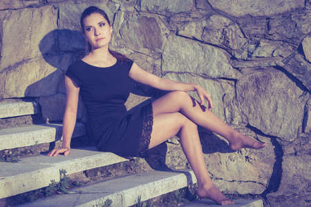 portrait of a beautiful young  girl  outdoors at the day timeの写真素材
