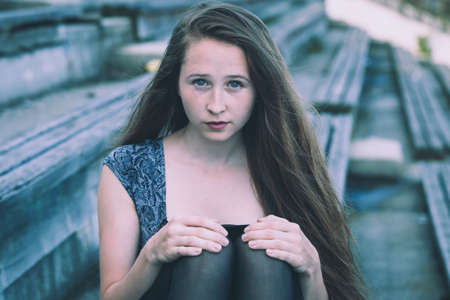 portrait of a beautiful young  girl  outdoors at the day time