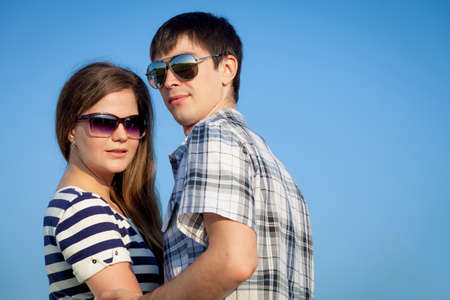 Portrait of young couple standing  in a field. Concept of beautiful couple in love.の写真素材