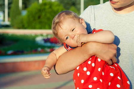 Happy brother and sister playing in park at the day time. People having fun on the nature. Concept of happiness.の写真素材