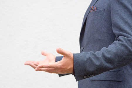 Close up of a handsome male speaker while giving a speech.の写真素材