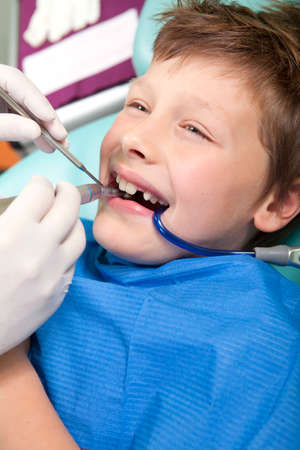 Young boy in a dental surgeryの写真素材