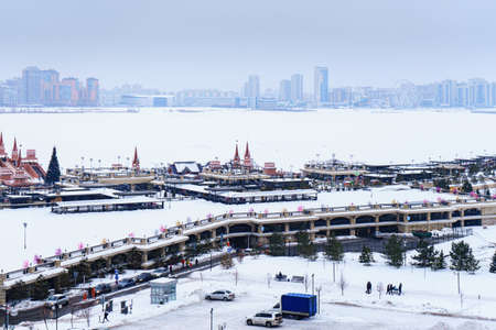 The view of the city and the embankment of the Kazanka river in the winter cloudy day in Kazanのeditorial素材