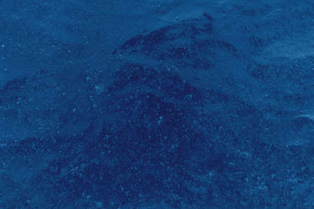 Color of the year 2020 classic blue. Liquid cosmetic texture with bubbles on surface. Modern luxury...