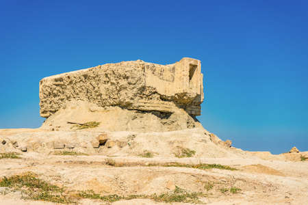 Coastal fortifications or pillboxes left over from Great Patriotic War on coast of Black sea, Feodosia vicinity, Crimea. Weapon emplacements at seaside in summer sunny day. Cognitive tourism conceptの写真素材