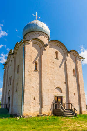 Church of Our Savior on Nereditsa, Velikiy Novgorod vicinity, Russia. White stone orthodox temple against blue sky. Monument of ancientの写真素材