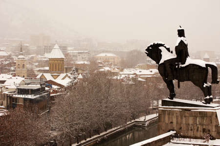 Winter view to covered with snow Tbilisi Old town in misty dayのeditorial素材