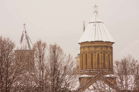 Winter view to covered with snow Tbilisi Old town in misty dayのeditorial素材