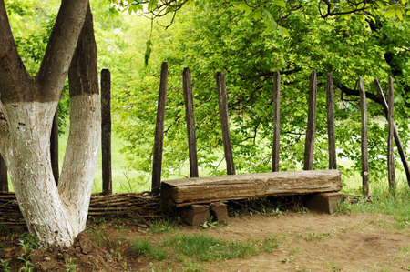 garden bench in rural landscapeの写真素材