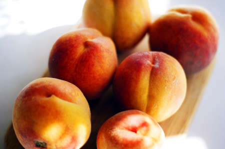 Closeup of ripe juicy peachesの写真素材