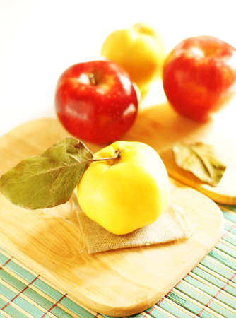 Autumn fruits: apple and quinceの写真素材