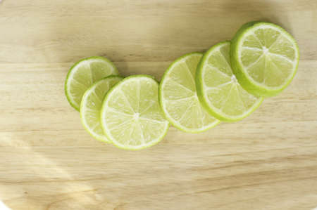 Fresh lemon on a wooden boardの写真素材