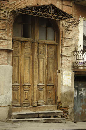 Old door in the most ancient part of Tbilisiの写真素材