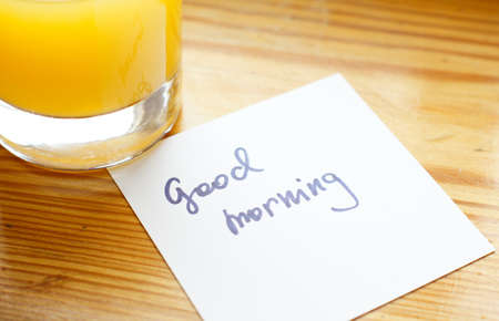Healthy breakfast: fresh orange juice and cupcake