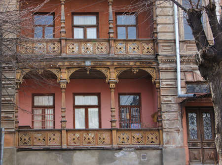 Traditional georgian architecture: wooden balconies and stone carvingsのeditorial素材