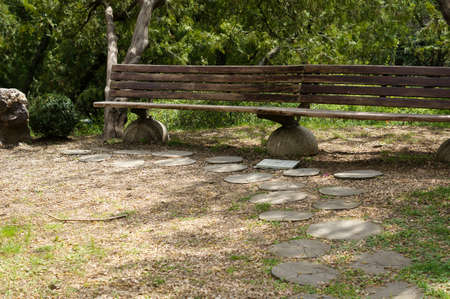 garden bench in rural landscapeの写真素材