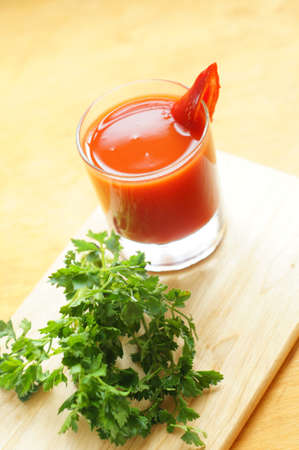 Healthy breakfasr: tomato's juice and fresh red peperの写真素材