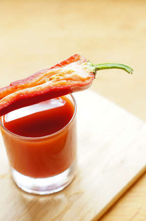 Healthy breakfasr: tomato's juice and fresh red peperの写真素材