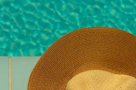Outdoor pool in the tropical area with blue water and laderの写真素材