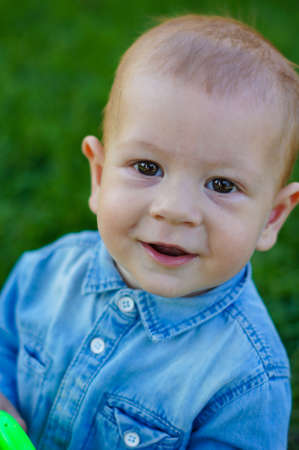 Little baby boy portrait outdoor