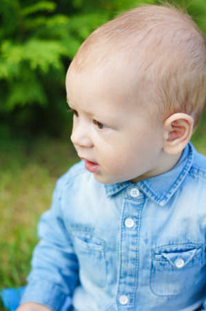 Little baby boy portrait outdoorの写真素材