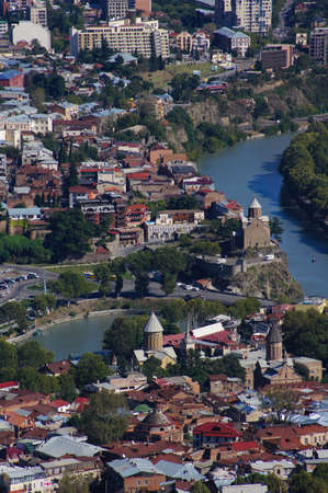 Panoramic view to Old Tbilisi from the saint Mount (Mtatsminda) with rainbow after the rainのeditorial素材