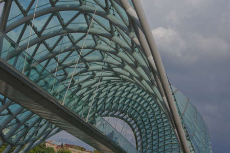 TBILISI, GEORGIA - SEPTEMBER 12: The Bridge of Peace on September 12, 2013. The bridge stretches over the Kura river and connects the areas of old Tbilisi.のeditorial素材