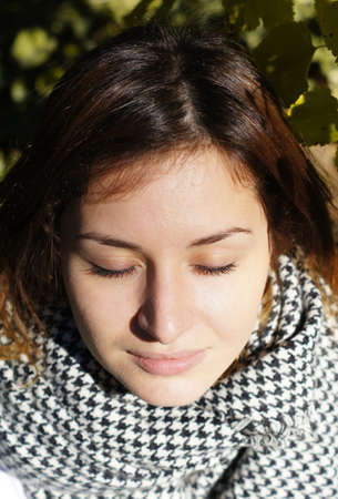 Portrait of young beautiful woman outdoorの写真素材