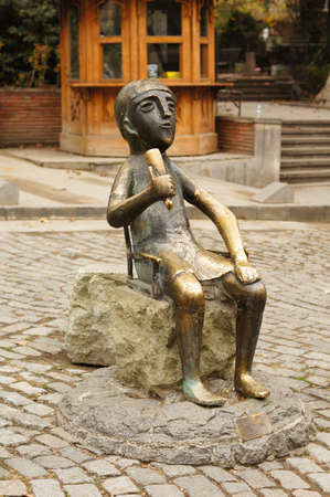 TBILISI, GEORGIA - NOVEMBER 23: Statue of Tamada on Sioni's street  on November 23, 2013 in Tbilisi, Georgia. The statue of tamada is a copy of ancient gold statue of national symbol of georgian wine culture - tamada, located on Sioni street in Old Tbilisのeditorial素材