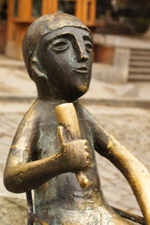 TBILISI, GEORGIA - NOVEMBER 23: Statue of Tamada on Sioni's street  on November 23, 2013 in Tbilisi, Georgia. The statue of tamada is a copy of ancient gold statue of national symbol of georgian wine culture - tamada, located on Sioni street in Old Tbilisのeditorial素材